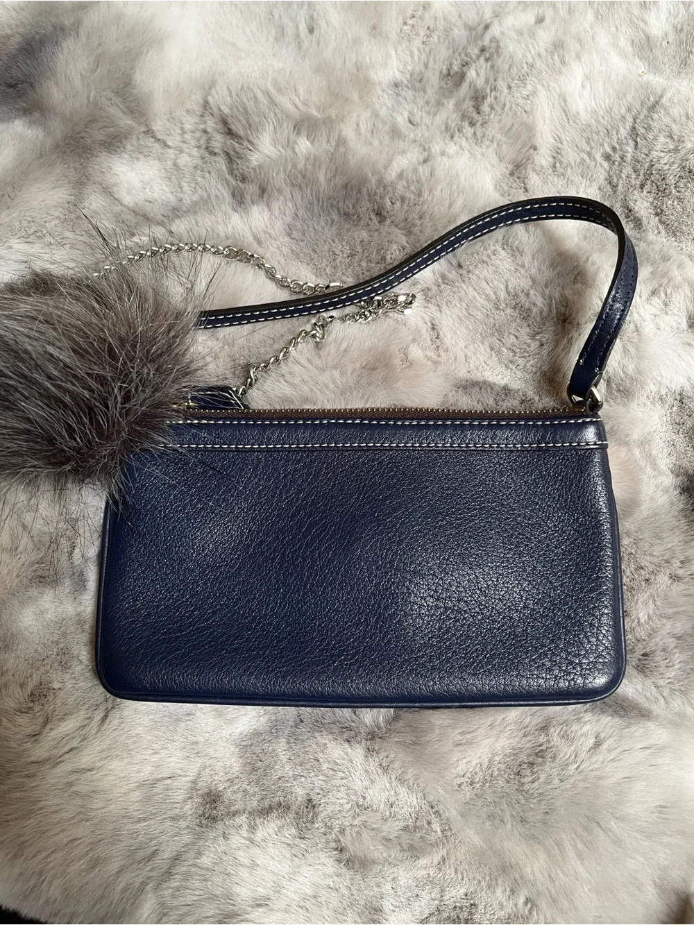 Dooney & Bourke Navy Pebbled Leather Wristlet with Fur Pom